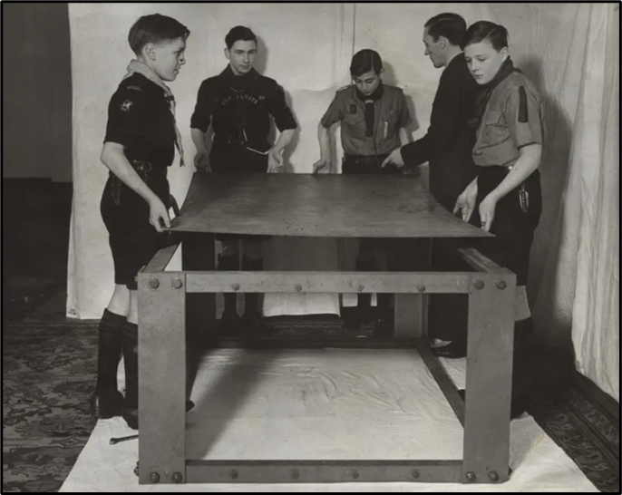 Boys building an Anderson shelter.
