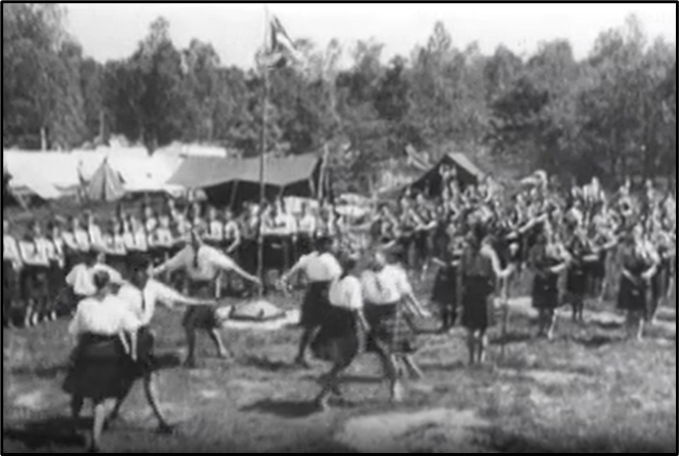 scouts in kilts dancing