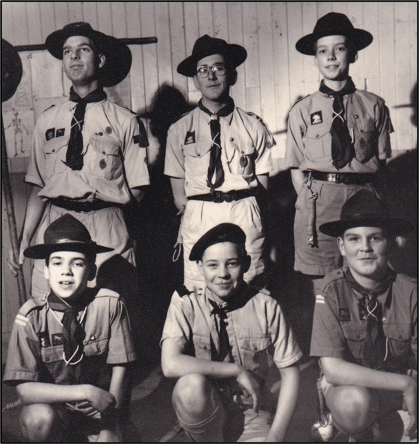 boy scouts posing for black and white photo